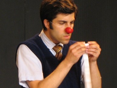 Paolozza as a clown in "Tools," a 2008 co-production with Why Not Theatre also featuring Ravi Jain and Katrina Bugaj (photo by Bertold Weisner)