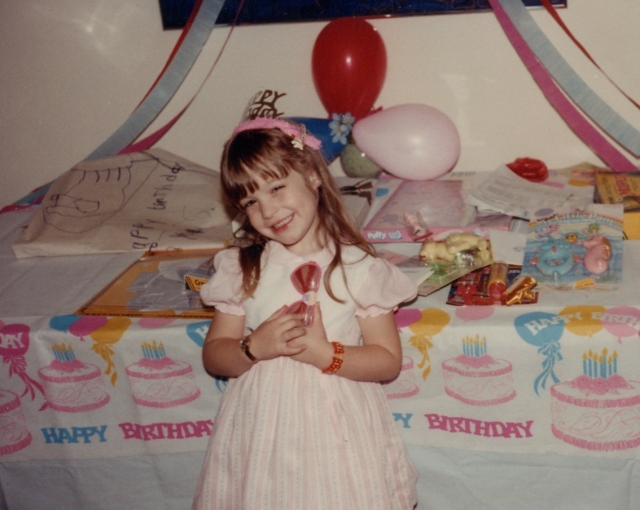 Sandra Beasley as a young girl celebrating her birthday (photo courtesy of Sandra Beasley)