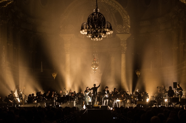 Patrick Watson and his band performing with an orchestra (photo courtesy of Patrick Watson)