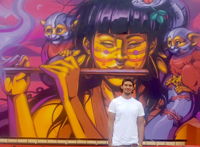 Nasca Uno in front of the mural he created for the 2019 Berlin Lollapalooza music festival (photo by Anita Malhotra, Sept. 7, 2019)