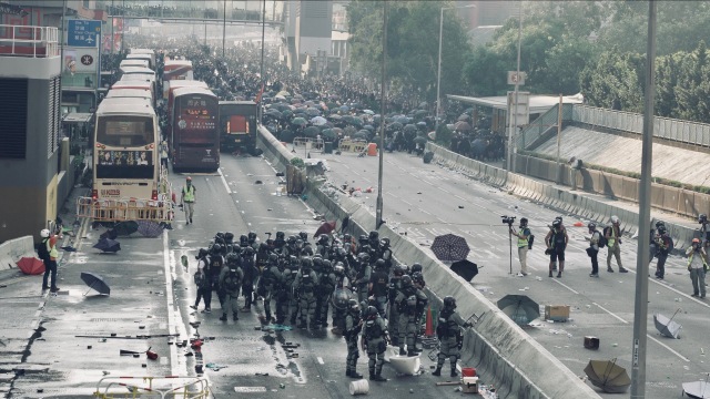 Zhou Bing's crew filming a street demonstration in "Hong Kong Moments" (photo courtesy of Hot Docs Festival and Zhou Bing)
