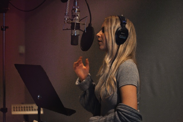 Dani Kristina recording a song (photo courtesy of Dani Kristina)